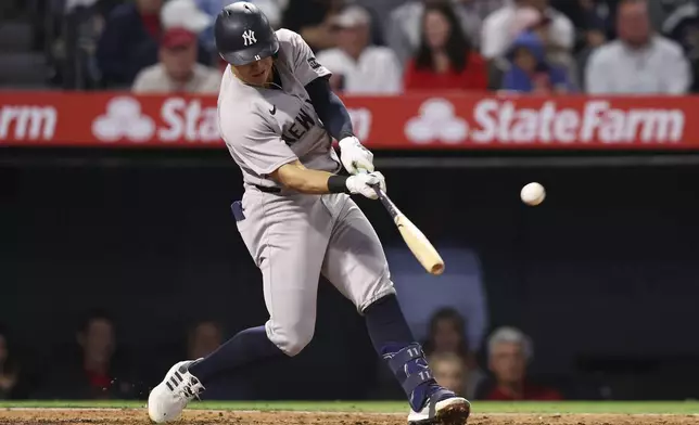New York Yankees' Anthony Volpe hits a double during the eighth inning of a baseball game against the Los Angeles Angels in Anaheim, Calif., Wednesday, May 28, 2025. (AP Photo/Jessie Alcheh)