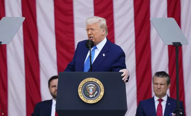 President Donald Trump delivers the Memorial Day Address at the 157th National Memorial Day Observance at Arlington National Cemetery, Monday, May 26, 2025, in Arlington, Va., as Vice President JD Vance and Secretary of Defense Pete Hegseth, right, look on. (AP Photo/Julia Demaree Nikhinson)