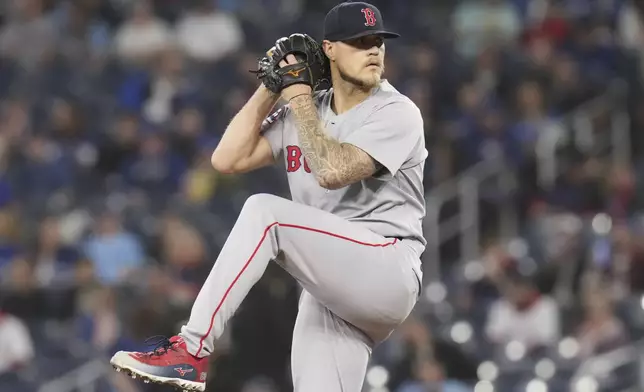 Boston Red Sox pitcher Tanner Houck works against the Toronto Blue Jays during first-inning baseball game action in Toronto, Thursday, May 1, 2025. (Chris Young/The Canadian Press via AP)