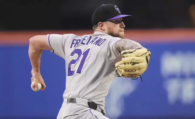 Colorado Rockies' Kyle Freeland (21) pitches during the second inning of a baseball game against the New York Mets Friday, May 30, 2025, in New York. (AP Photo/Frank Franklin II)