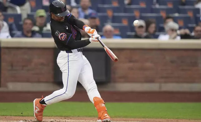New York Mets' Francisco Lindor hits a home run during the first inning of a baseball game against the Colorado Rockies Friday, May 30, 2025, in New York. (AP Photo/Frank Franklin II)