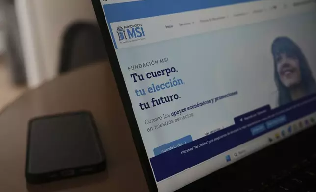 A computer monitor shows the splash page of the MSI Foundation website with a message that reads in Spanish: "Your body, your choice, your future", during a tour of the foundation, a non-governmental agency that offers information and help to women seeking abortions, in Mexico City, Thursday, May 8, 2025. (AP Photo/Marco Ugarte)