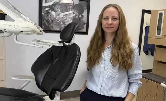 Sasha Harvey, executive director of Salt Lake Donated Dental Services, stands in her clinic that provides free or heavily discounted dental treatment to low-income patients, Monday, May 5, 2025, in Salt Lake City, Utah. (AP Photo/Hannah Schoenbaum)
