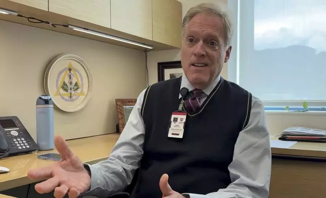 Dr. James Bekker, a dentist in Salt Lake City, explains in an interview on April 30, 2025, how he is preparing his patients and dental students for Utah's first-in-the-nation fluoride ban to take effect May 7, 2025. (AP Photo/Hannah Schoenbaum)