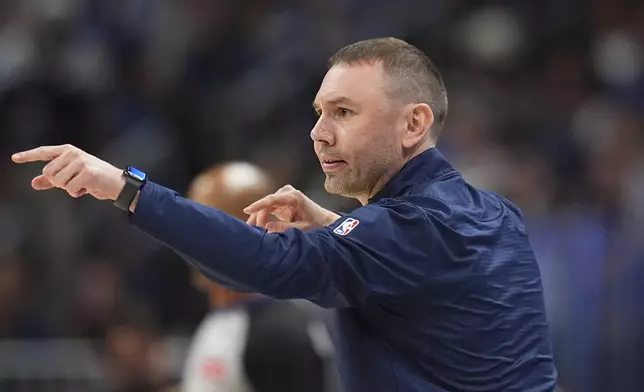 Denver Nuggets head coach David Adelman directs his team against the Los Angeles Clippers in the second half of Game 7 of an NBA basketball first-round playoff series Saturday, May 3, 2025, in Denver. (AP Photo/David Zalubowski)