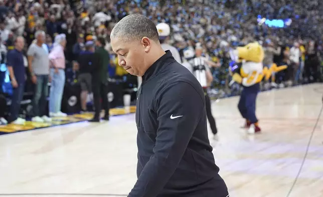 Los Angeles Clippers head coach Tyronn Lue heads off the court after Game 7 of an NBA basketball first-round playoff series against the Denver Nuggets, Saturday, May 3, 2025, in Denver. (AP Photo/David Zalubowski)