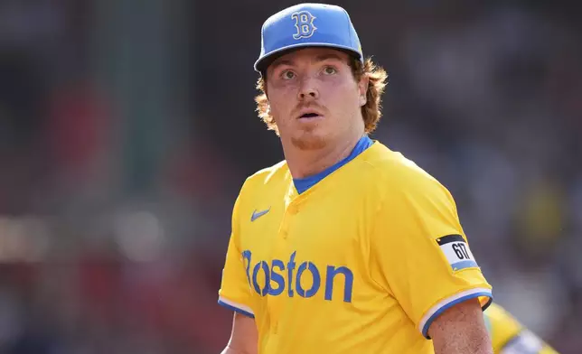 Boston Red Sox starting pitcher Hunter Dobbins looks to the scoreboard after the second inning in a baseball against the Minnesota Twins, Saturday, May 3, 2025, in Boston. (AP Photo/Robert F. Bukaty)