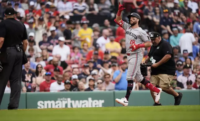 Minnesota Twins' Kody Clemens celebrates after hitting a 2-run home run in the sixth inning of a baseball game against the Boston Red Sox, Saturday, May 3, 2025, in Boston. (AP Photo/Robert F. Bukaty)