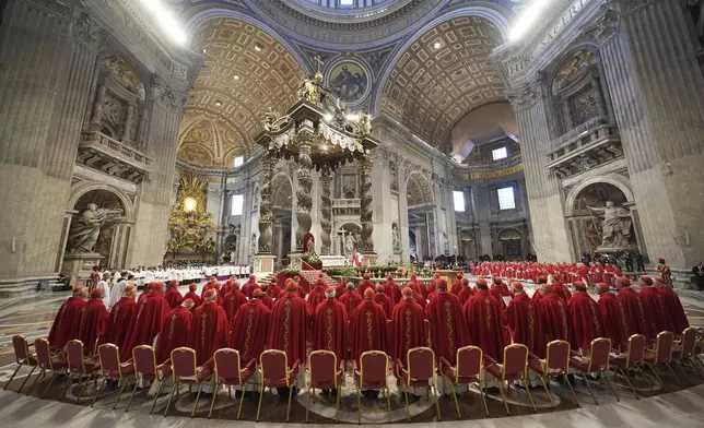 Cardinals attend a mass on the fifth of nine days of mourning for late Pope Francis, in St. Peter's Basilica at the Vatican, Wednesday, April 30, 2025. (AP Photo/Alessandra Tarantino)