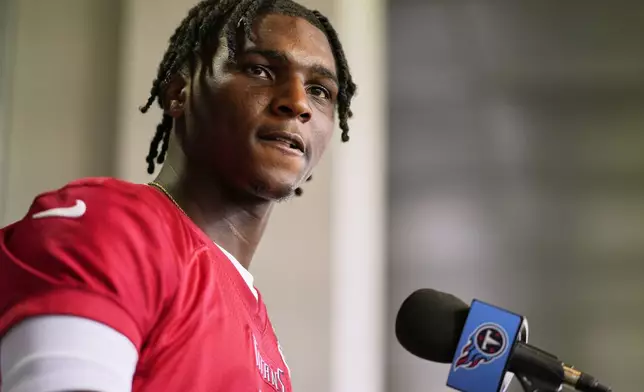 Tennessee Titans quarterback Cam Ward speaks during a news conference after the NFL football team's rookie minicamp Saturday, May 10, 2025, in Nashville, Tenn. (AP Photo/George Walker IV)