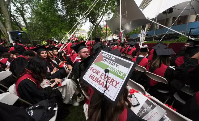 Graduating students attend commencement ceremonies at Harvard University, Thursday, May 29, 2025 in Cambridge, Mass. (AP Photo/Charles Krupa)