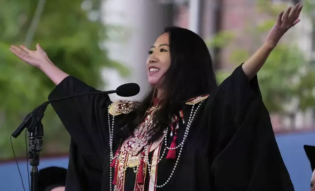 Yurong "Luanna" Jiang addresses classmates during commencement ceremonies at Harvard University, Thursday, May 29, 2025, in Cambridge, Mass. (AP Photo/Charles Krupa)