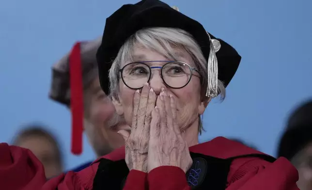 Actress and honorary degree recipient Rita Moreno reacts during her introduction during commencement ceremonies at Harvard University, Thursday, May 29, 2025, in Cambridge, Mass. (AP Photo/Charles Krupa)