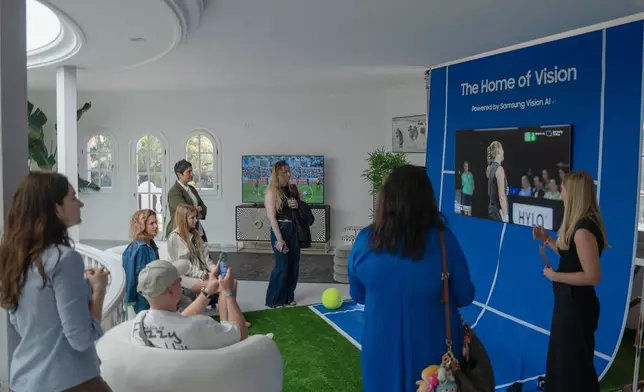 Sports Zone at The Home of Vision, Powered by Samsung Vision AI, showing Samsung TV spokesperson, Kiia Kaipainen, demonstration AI Motion Enhancer Pro to guests