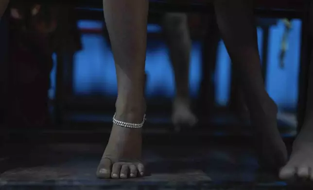 A girl wearing a silver anklet attends class at the Signal Shala school in Thane near Mumbai, India, April 9, 2025. (AP Photo/Rafiq Maqbool)