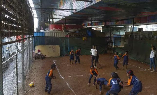 Students play kabbadi, a traditional Indian sport, at the Signal Shala school in Thane near Mumbai, India, April 3, 2025. (AP Photo/Rafiq Maqbool)