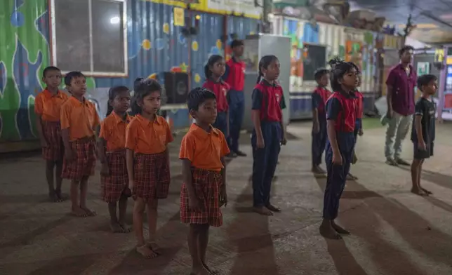 Students sing the Indian national anthem at the Signal Shala school in Thane near Mumbai, India, April 9, 2025. (AP Photo/Rafiq Maqbool)