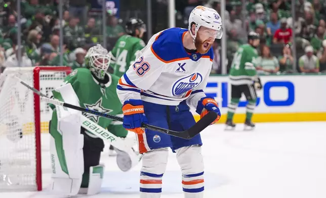 Edmonton Oilers right wing Connor Brown reacts after scoring a goal against the Dallas Stars during the second period in Game 2 of the Western Conference finals in the NHL hockey Stanley Cup playoffs, Friday, May 23, 2025, in Dallas. (AP Photo/LM Otero)