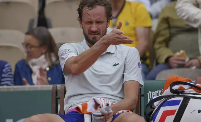 Russia's Daniil Medvedev reacts as he plays Britain's Cameron Norrie during their first round match of the French Tennis Open, at the Roland-Garros stadium, in Paris, Tuesday, May 27, 2025. (AP Photo/Thibault Camus)