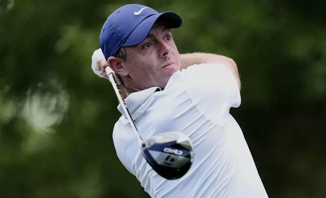 Rory McIlroy, of Northern Ireland, watches his tee shot on the second hole during a practice round for the PGA Championship golf tournament at the Quail Hollow Club, Tuesday, May 13, 2025, in Charlotte, N.C. (AP Photo/George Walker IV)