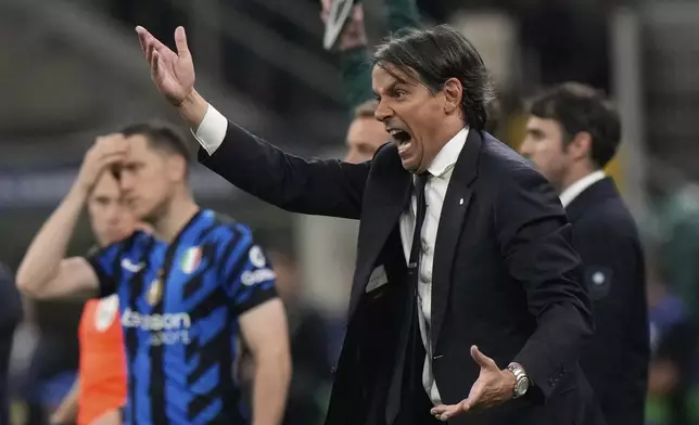 Inter Milan's head coach Simone Inzaghi shouts out as gives instructions from the side line during the Champions League semifinal second leg soccer match between Inter Milan and Barcelona at San Siro stadium in Milan , Italy, Tuesday, May 6, 2025. (AP Photo/Luca Bruno)
