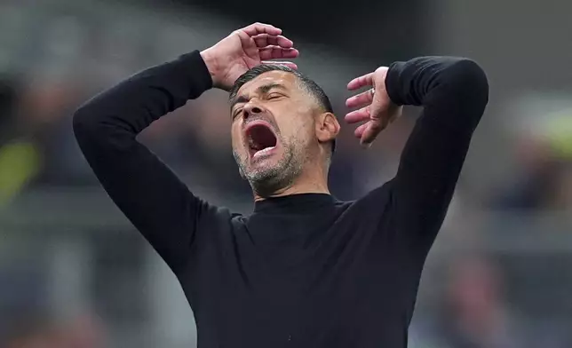 AC Milan's head coach Sergio Conceicao reacts during the Serie A soccer match between Milan and Bologna at San Siro Stadium in Milan, Italy, Friday May 9, 2025. (Spada/LaPresse via AP)