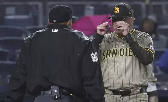 San Diego Padres manager Mike Shildt, right, argues with umpire Adrian Johnson during the eighth inning of a baseball game against the New York Yankees Monday, May 5, 2025, in New York. (AP Photo/Pamela Smith)