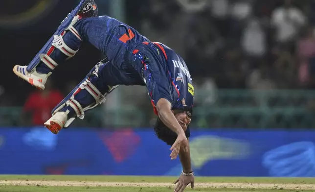 Lucknow Super Giants' captain Rishabh Pant celebrates after scoring a century during the Indian Premier League cricket match between Lucknow Super Giants and Royal Challengers Bengaluru at Atal Bihari Vajpayee Ekana Cricket Stadium in Lucknow, India, Tuesday, May 27, 2025. (AP Photo)