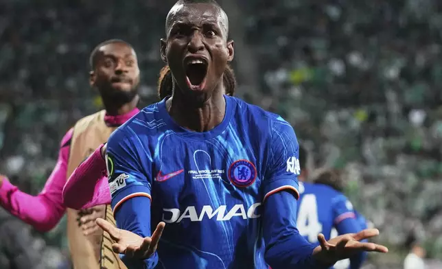 Chelsea's Nicolas Jackson celebrates after scoring during the Europa League final soccer match between Real Betis and Chelsea in Wroclaw, Poland, Wednesday, May 28, 2025. (AP Photo/Petr David Josek)