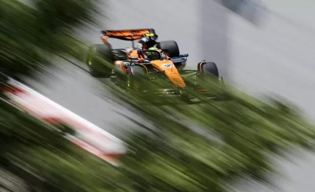 McLaren driver Lando Norris of Britain steers his car during the first free practice ahead of the Spanish Grand Prix Formula One race at the Barcelona Catalunya racetrack in Montmelo, near Barcelona, Spain, Friday, May 30, 2025. (AP Photo/Joan Monfort)