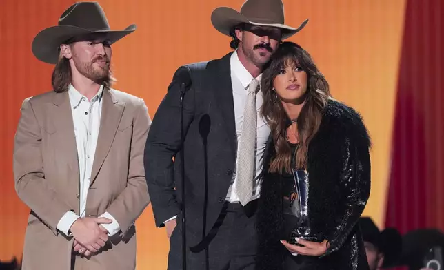 Will Bunny, from left, Riley Green, and Ella Langley accept the award for single of the year for "You Look Like You Love Me" during the 60th annual Academy of Country Music Awards on Thursday, May 8, 2025, in Frisco, Texas. (AP Photo/Chris Pizzello)