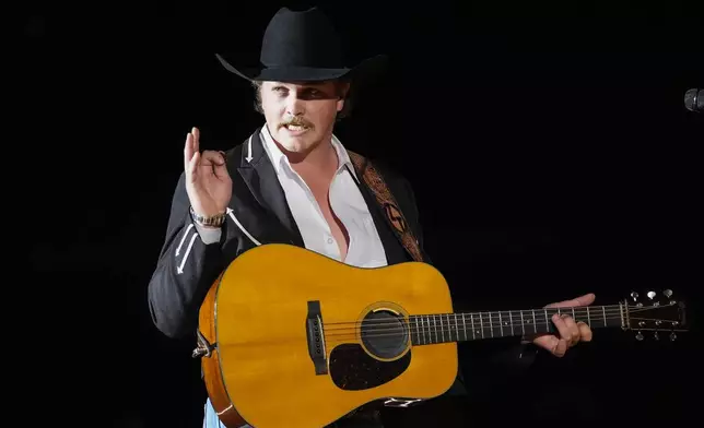 Zach Top performs "Use Me" during the 60th annual Academy of Country Music Awards on Thursday, May 8, 2025, in Frisco, Texas. (AP Photo/Chris Pizzello)
