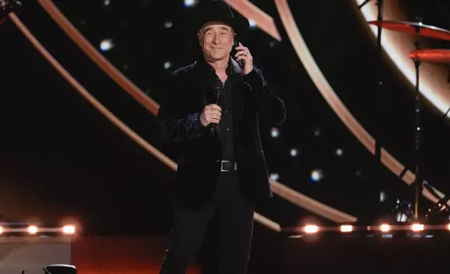 Clint Black performs "Rhinestone Cowboy" during the 60th annual Academy of Country Music Awards on Thursday, May 8, 2025, in Frisco, Texas. (AP Photo/Chris Pizzello)