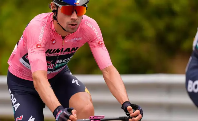 Slovenia's Primoz Roglic pedals during the third stage of the Giro d'Italia cycling race, from Vlore to Vlore, Albania, Sunday, May 11, 2025. (Fabio Ferrari/LaPresse via AP)