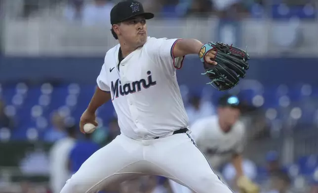 Miami Marlins pitcher Valente Bellozo (83) aims a pitch during the first inning of a baseball game against the Los Angeles Dodgers, Wednesday, May 7, 2025, in Miami. (AP Photo/Marta Lavandier)