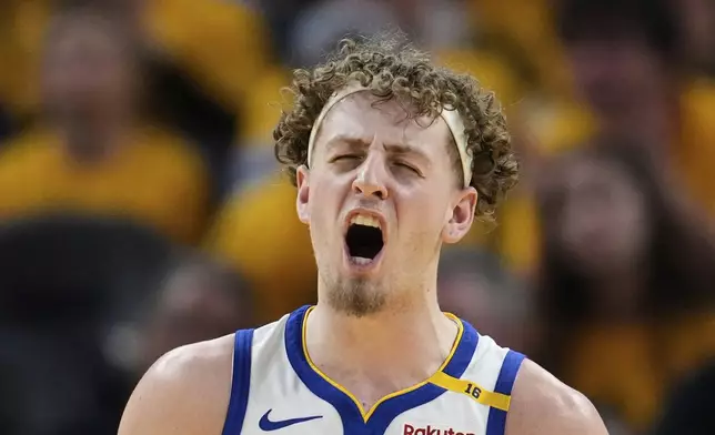 Golden State Warriors guard Brandin Podziemski reacts during the first half of Game 3 of an NBA basketball second-round playoff series against the Minnesota Timberwolves, Saturday, May 10, 2025, in San Francisco. (AP Photo/Godofredo A. Vásquez)