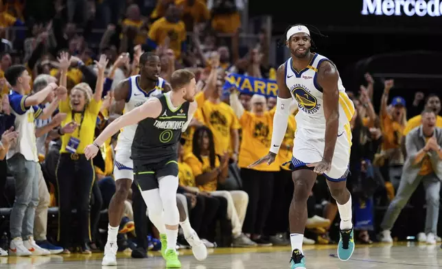 Golden State Warriors guard Buddy Hield (7) reacts after making a 3-point basket during the second half of Game 3 of an NBA basketball second-round playoff series against the Minnesota Timberwolves, Saturday, May 10, 2025, in San Francisco. (AP Photo/Godofredo A. Vásquez)