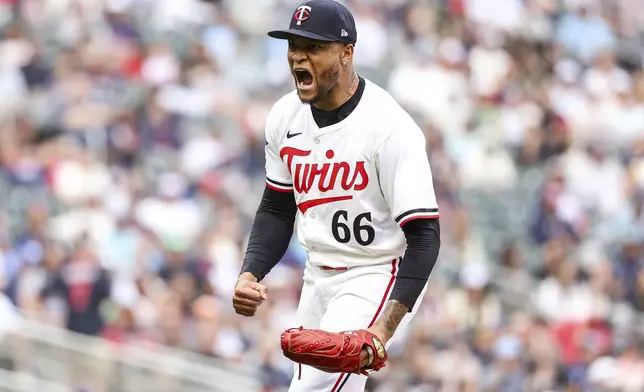 Minnesota Twins relief pitcher Jorge Alcala celebrates after ending the top of the sixth inning of baseball game against the Kansas City Royals Saturday, May 24, 2025, in Minneapolis. (AP Photo/Matt Krohn)