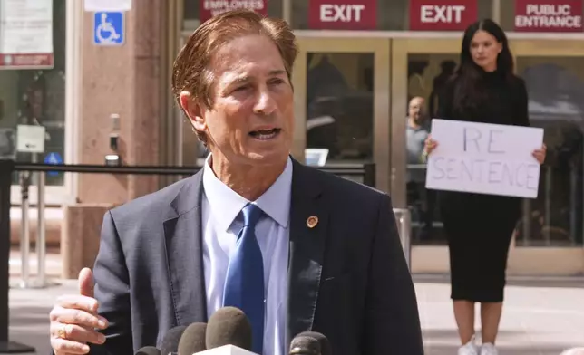 Los Angeles County District Attorney Nathan Hochman speaks to the media during a hearing in the case of Erik and Lyle Menendez Tuesday, May 13, 2025, in Los Angeles. (AP Photo/Damian Dovarganes)