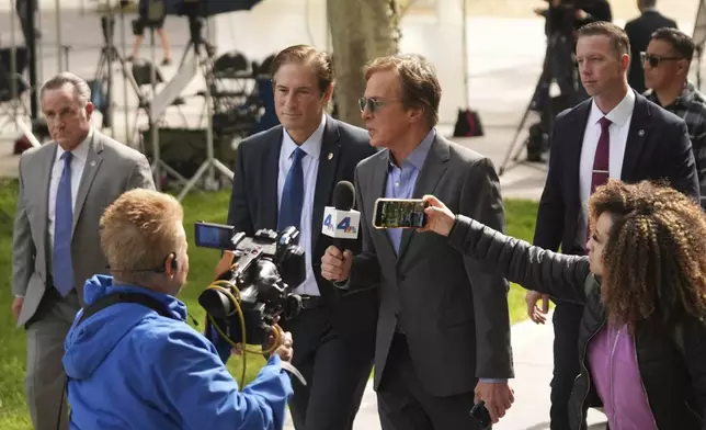 Los Angeles County District Attorney Nathan Hochman arrives in court for a hearing in the case of Erik and Lyle Menendez Tuesday, May 13, 2025, in Los Angeles. (AP Photo/Damian Dovarganes)