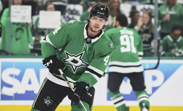 Dallas Stars defenseman Miro Heiskanen warms up before Game 4 of a second-round NHL hockey playoff series against the Winnipeg Jets in Dallas, Tuesday, May 13, 2025. (AP Photo/Gareth Patterson)