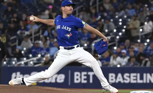 Toronto Blue Jays starting pitcher Chris Bassitt (40) throws to a San Diego Padres batter during first inning MLB baseball action in Toronto on Tuesday, May 20, 2025. (Jon Blacker/The Canadian Press via AP)