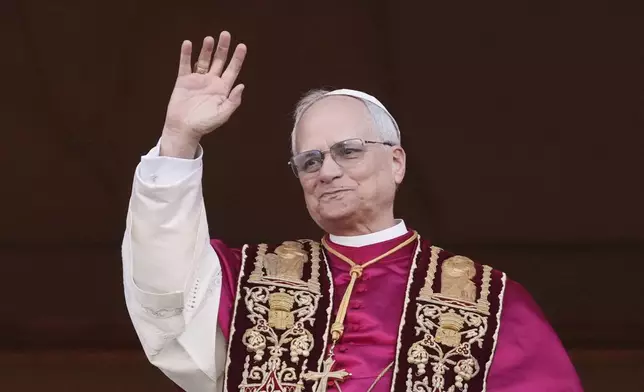 Pope Leo XIV appears on the central loggia of St. Peter's Basilica after being chosen the 267th pontiff of the Roman Catholic Church, at the Vatican, Thursday, May 8, 2025. (AP Photo/Alessandra Tarantino)