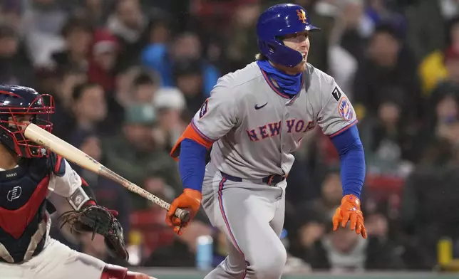 New York Mets' Brett Baty watches his single in the fifth inning of a baseball game against the Boston Red Sox at Fenway Park, Wednesday, May 21, 2025, in Boston. (AP Photo/Charles Krupa)