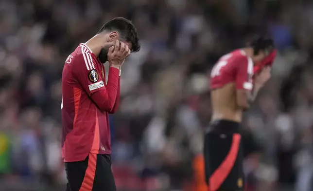 Manchester United reacts at the end of the Europa League final soccer match between Tottenham Hotspur and Manchester United at the San Mames Stadium in Bilbao, Spain, Wednesday, May 21, 2025. (AP Photo/Bernat Armangue)