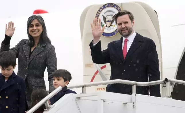 FILE - U.S. Vice President JD Vance and second lady Usha Vance, with their children Ewan, Vivek and Mirabel, wave as they arrive at the Munich airport in Munich, Germany, Feb. 13, 2025. (AP Photo/Matthias Schrader, File)