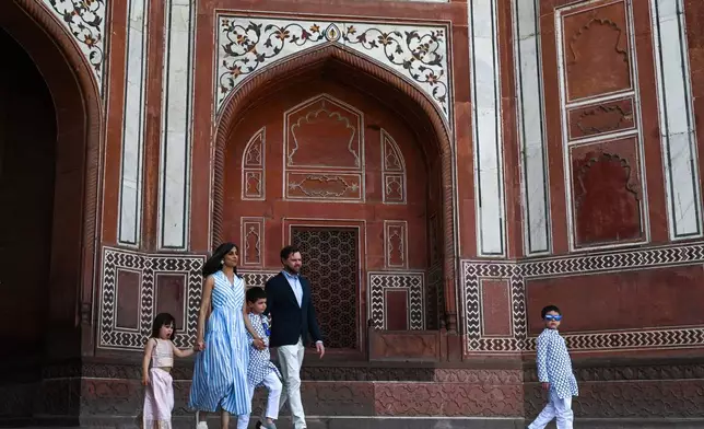 U.S. Vice President JD Vance and his family, including wife Usha Vance, visit the Taj Mahal on Wednesday, April 23, 2025, in Agra, India. (Kenny Holston/The New York Times via AP, Pool)