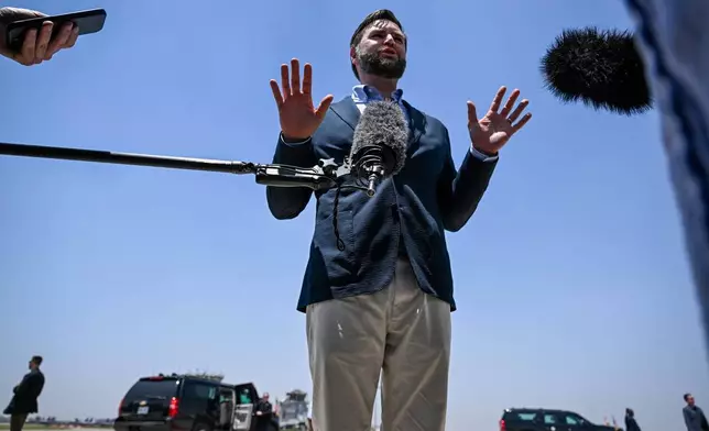 U.S. Vice President JD Vance speaks to media as he departs Agra, India en route to Jaipur, India after visiting the Taj Mahal on Wednesday, April 23, 2025, in Agra, India. (Kenny Holston/The New York Times via AP, Pool)