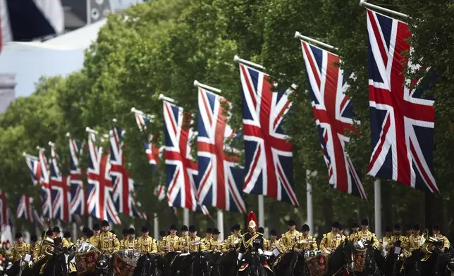 Members of the armed forces parade down The Mall, during the VE Day 80th anniversary parade, in London, Monday, May 5, 2025. (Henry Nicholls/Pool Photo via AP)