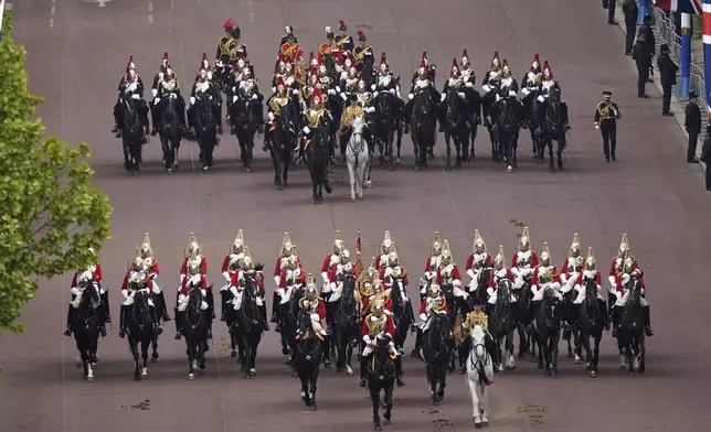 Members of the armed forces ride, during the VE Day 80th anniversary parade, in London, Monday, May 5, 2025. (Andrew Matthews/Pool Photo via AP)